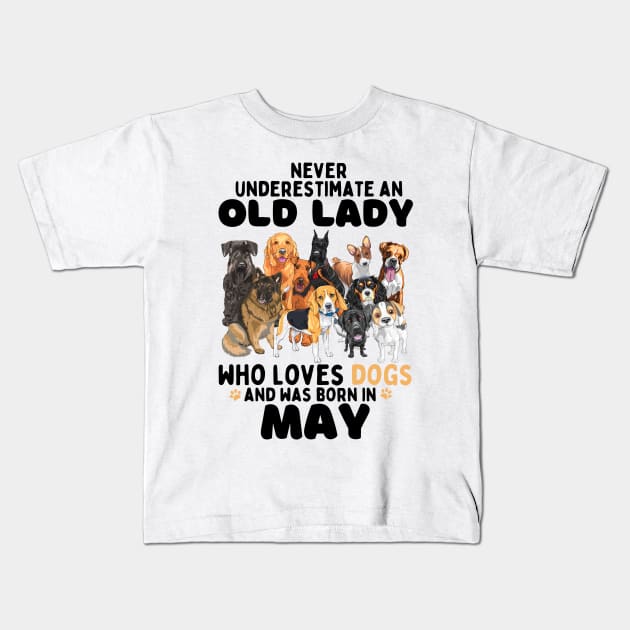 Never Underestimate An Old Lady Who Loves Dogs And Was may Kids T-Shirt by JustBeSatisfied